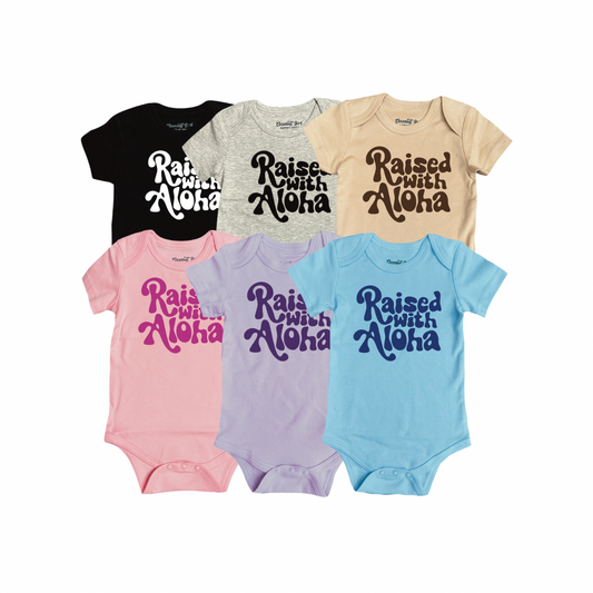 RAISED WITH ALOHA ONESIE